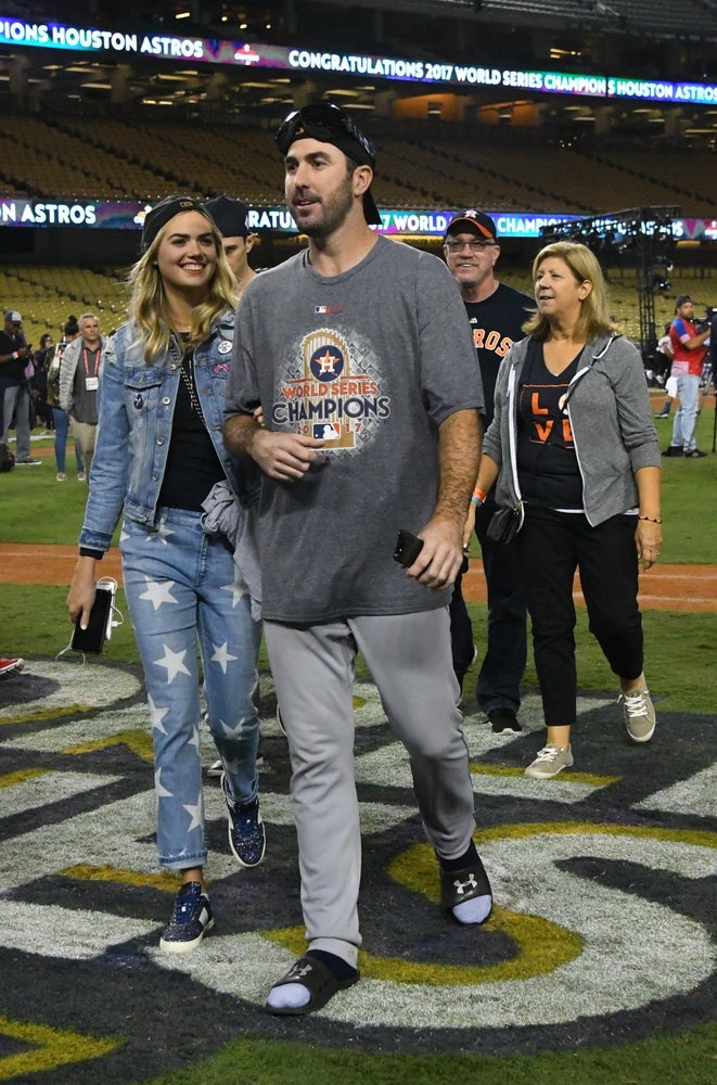 Nov 1, 2017; Los Angeles, CA, USA; Houston Astros pitcher Justin Verlander (right) walks off the field with Kate Upton after game seven of the 2017 World Series against the Los Angeles Dodgers at Dodger Stadium. Mandatory Credit: Jayne Kamin-Oncea-Imagn Images