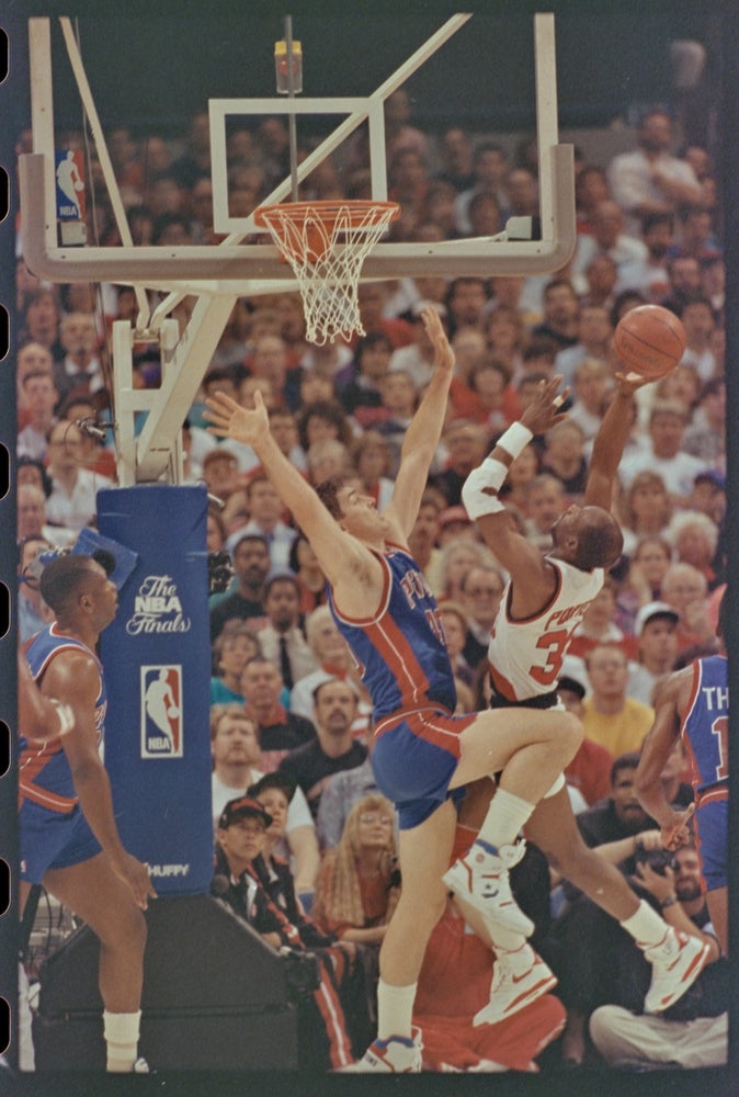 06/10/1990; Portland, Oregon, USA;  Trailblazers' Terry Porter lifts the ball toward the basket while being guarded by Pistons'' Bill Laimbeer in the third game of the NBA Finals, Mandatory Credit: Craig Porter, Detroit Free Press, USA Today Network 