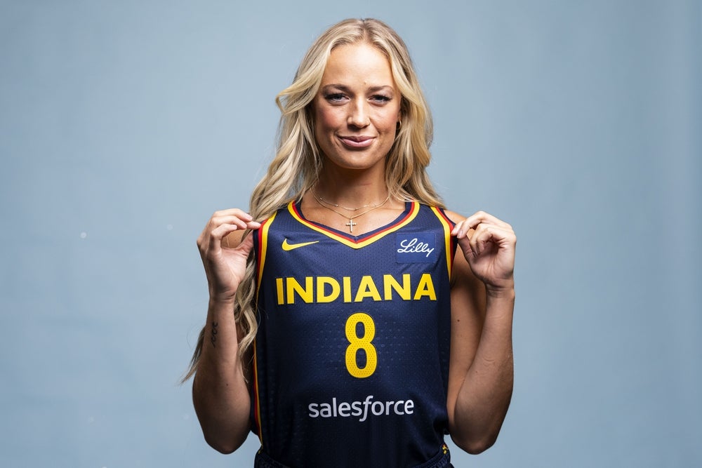 Apr 30, 2025; Indianapolis, IN, USA; Indiana Fever guard Sophie Cunningham poses for a photo Wednesday, April 30, 2025, during the Indiana Fever media day at Gainbridge Fieldhouse in Indianapolis. Mandatory Credit: Grace Smith-USA TODAY Network via Imagn Images