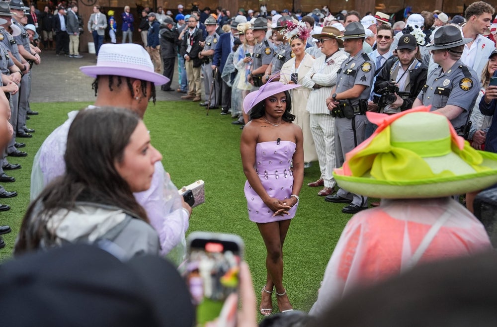 Olympian Simone Biles announced 'Riders Up' in the Paddock before the start of the 2025 Kentucky Derby Saturday, May 3 at Churchill Downs in Louisville, Kentucky.