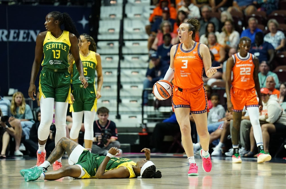 Jul 28, 2025; Uncasville, Connecticut, USA; Connecticut Sun guard Marina Mabrey (3) reacts after being called for a foul against Seattle Storm guard Erica Wheeler (17) in the first half at Mohegan Sun Arena. Mandatory Credit: David Butler II-Imagn Images
