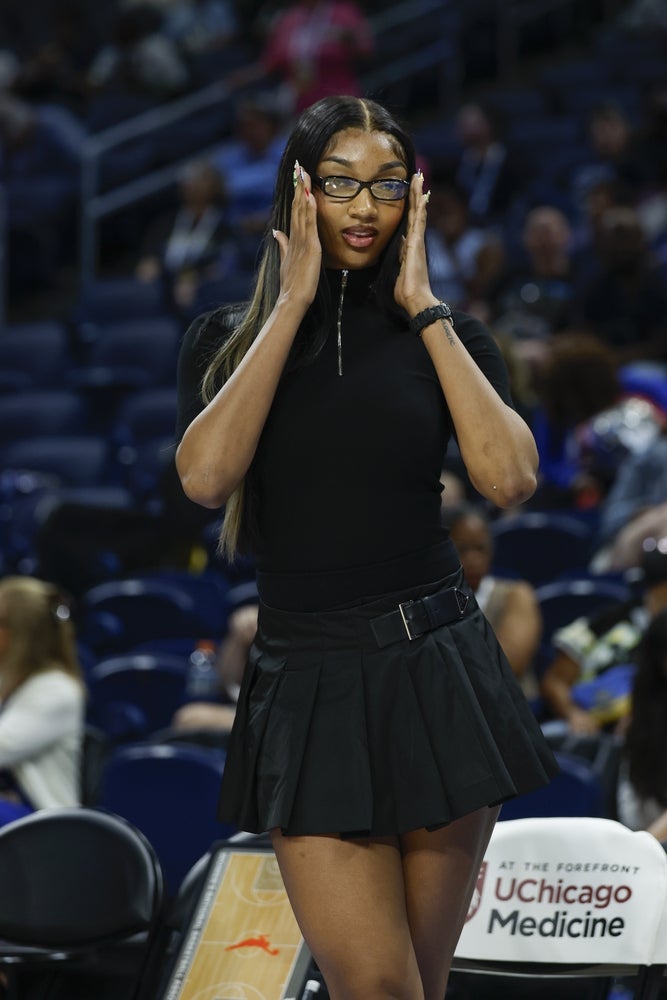 Aug 3, 2025; Chicago, Illinois, USA; Injured Chicago Sky forward Angel Reese (5) stands on the sidelines before a WNBA game against the Phoenix Mercury at Wintrust Arena. Mandatory Credit: Kamil Krzaczynski-Imagn Images