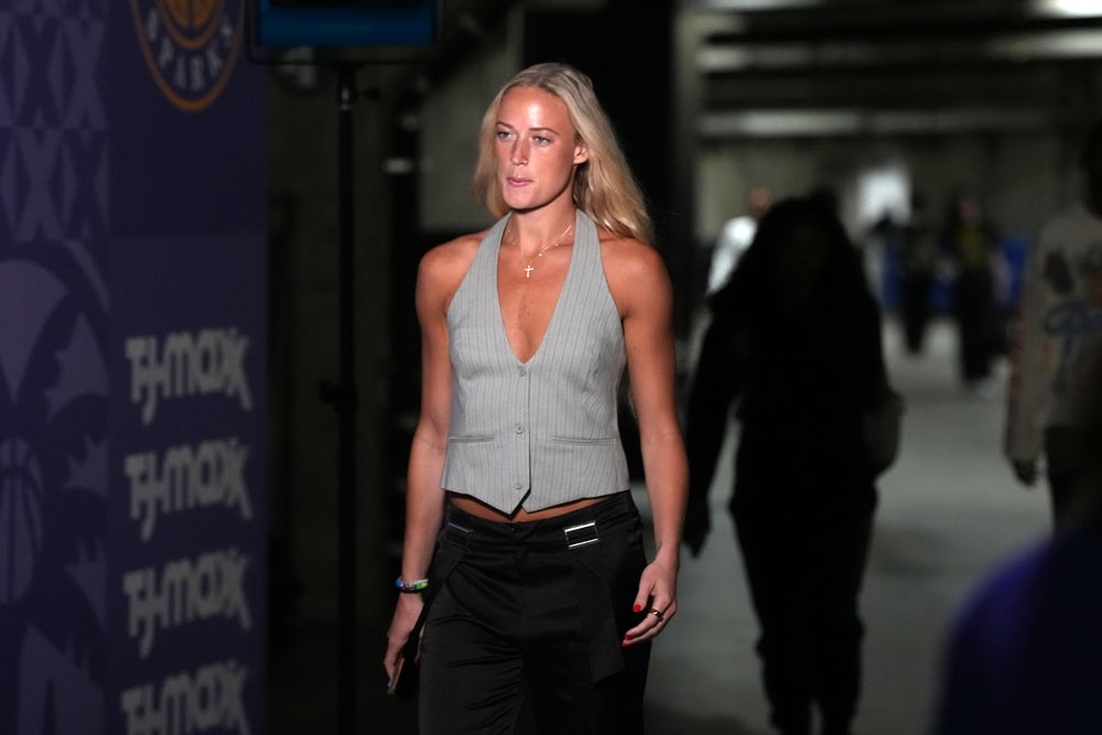 Aug 5, 2025; Los Angeles, California, USA; Indiana Fever guard Sophie Cunningham arrives before the game against the LA Sparks at the Crypto.com Arena. Mandatory Credit: Kirby Lee-Imagn Images