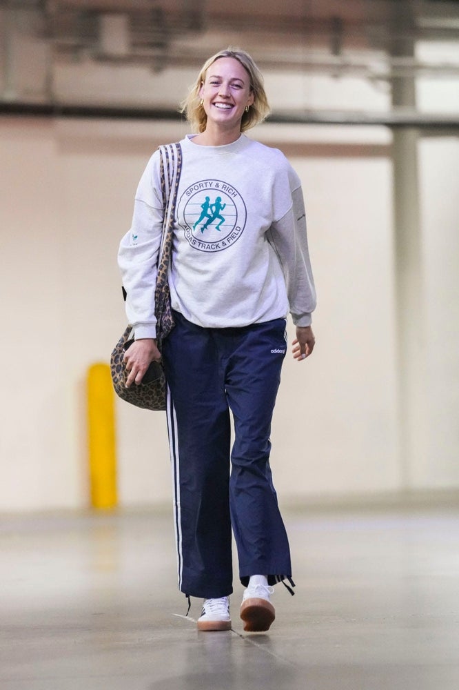Indiana Fever guard Sophie Cunningham (8) arrives Tuesday, Sept. 16, 2025, before Game 2 of a WNBA playoff matchup between the Indiana Fever and the Atlanta Dream at Gainbridge Fieldhouse in Indianapolis.
