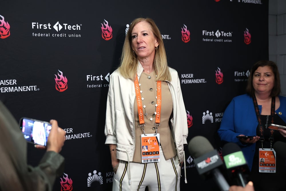 Jun 11, 2026; Portland, Oregon, USA;  WNBA Commissioner Cathy Engelbert meets with the working media before Portland Fire against the Las Vegas Aces at Moda Center. Mandatory Credit: Jaime Valdez-Imagn Images