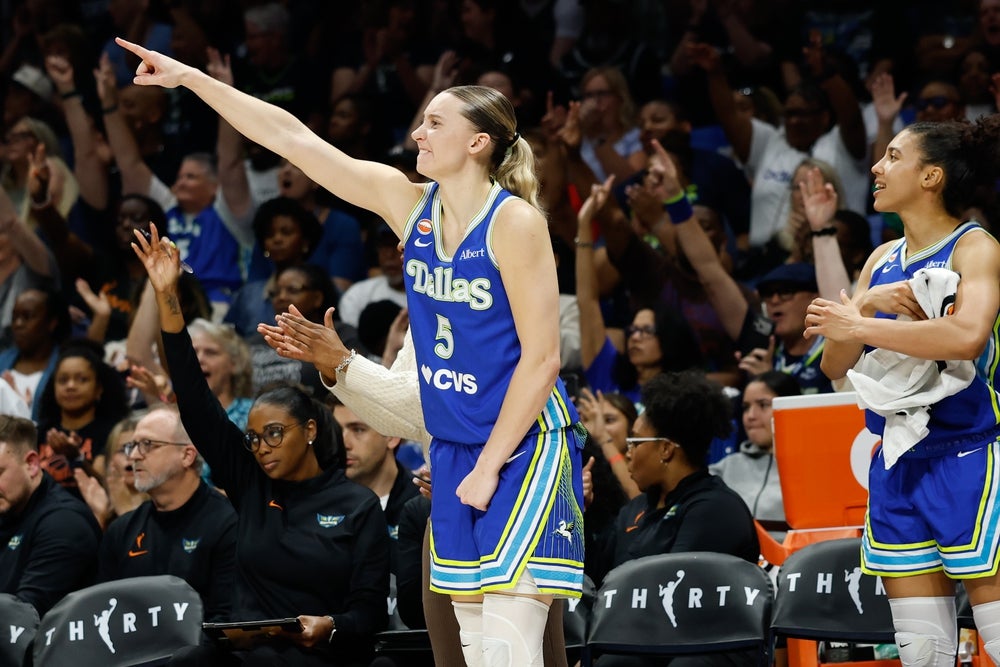 Jun 15, 2026; Arlington, Texas, USA; Dallas Wings guard Paige Bueckers (5) reacts after a play against the Las Vegas Aces during the second half at College Park Center. Mandatory Credit: Chris Jones-Imagn Images