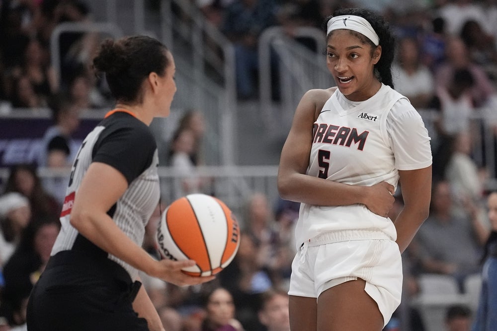 Jul 17, 2026; Toronto, Ontario, CAN; Atlanta Dream forward Angel Reese (5) talks with game official Tiara Cruse after a play against the Toronto Tempo during the second half at Coca-Cola Coliseum. Mandatory Credit: John E. Sokolowski-Imagn Images