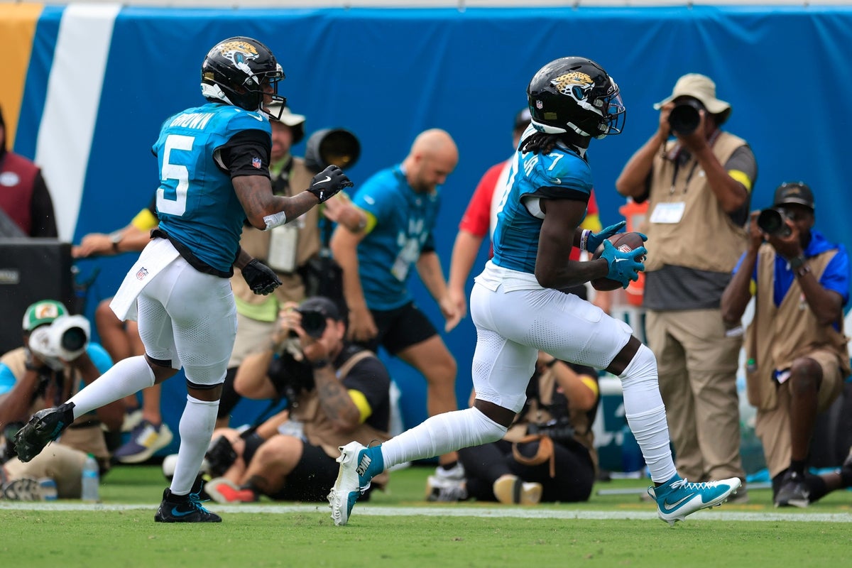 Jacksonville Jaguars wide receiver Brian Thomas Jr. (7) scores a rushing touchdown during the second quarter of an NFL football matchup at EverBank Stadium, Sunday, Sept. 7, 2025 in Jacksonville, Fla. [Corey Perrine/Florida Times-Union]