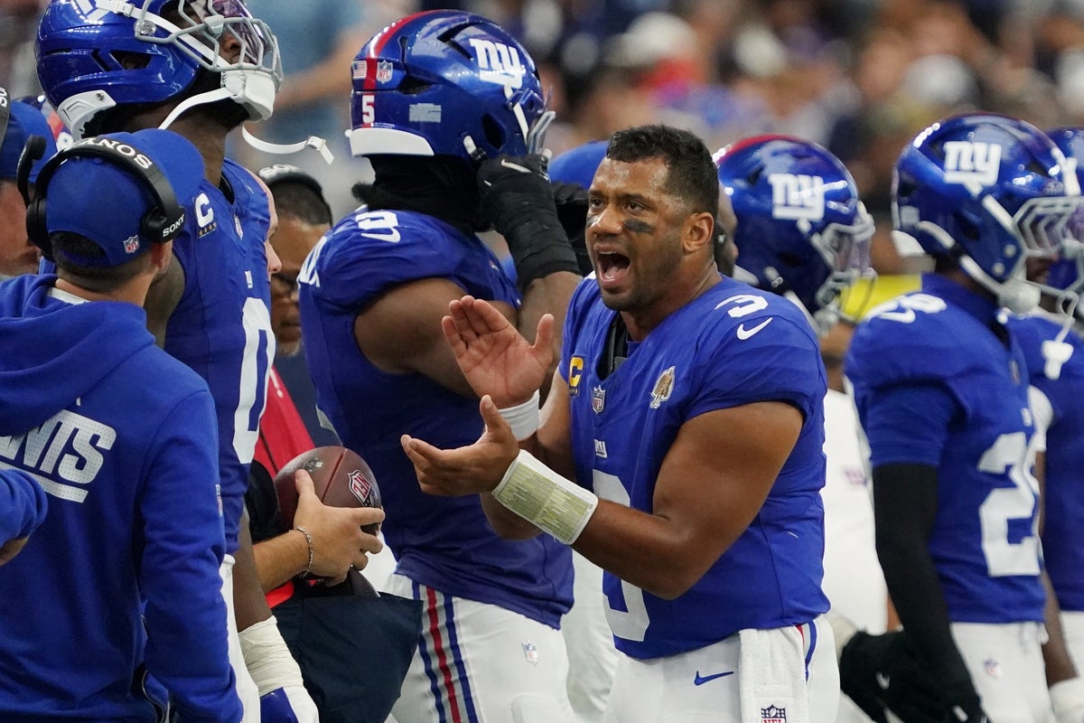 Sep 14, 2025; Arlington, Texas, USA; New York Giants quarterback Russell Wilson (3) claps after a play against the Dallas Cowboys during the fourth quarter at AT&T Stadium. Mandatory Credit: Raymond Carlin III-Imagn Images