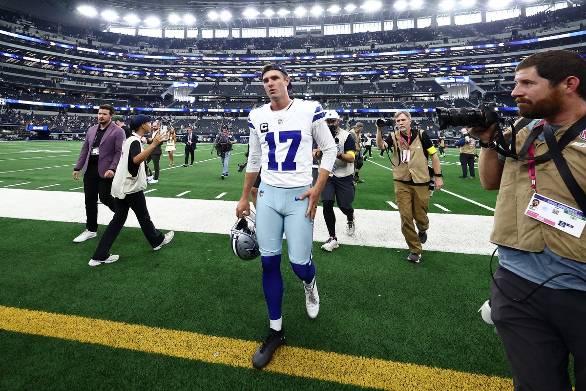 Sep 14, 2025; Arlington, Texas, USA; Dallas Cowboys place kicker Brandon Aubrey (17) walks off the field after the game against the New York Giants at AT&T Stadium. Mandatory Credit: Kevin Jairaj-Imagn Images