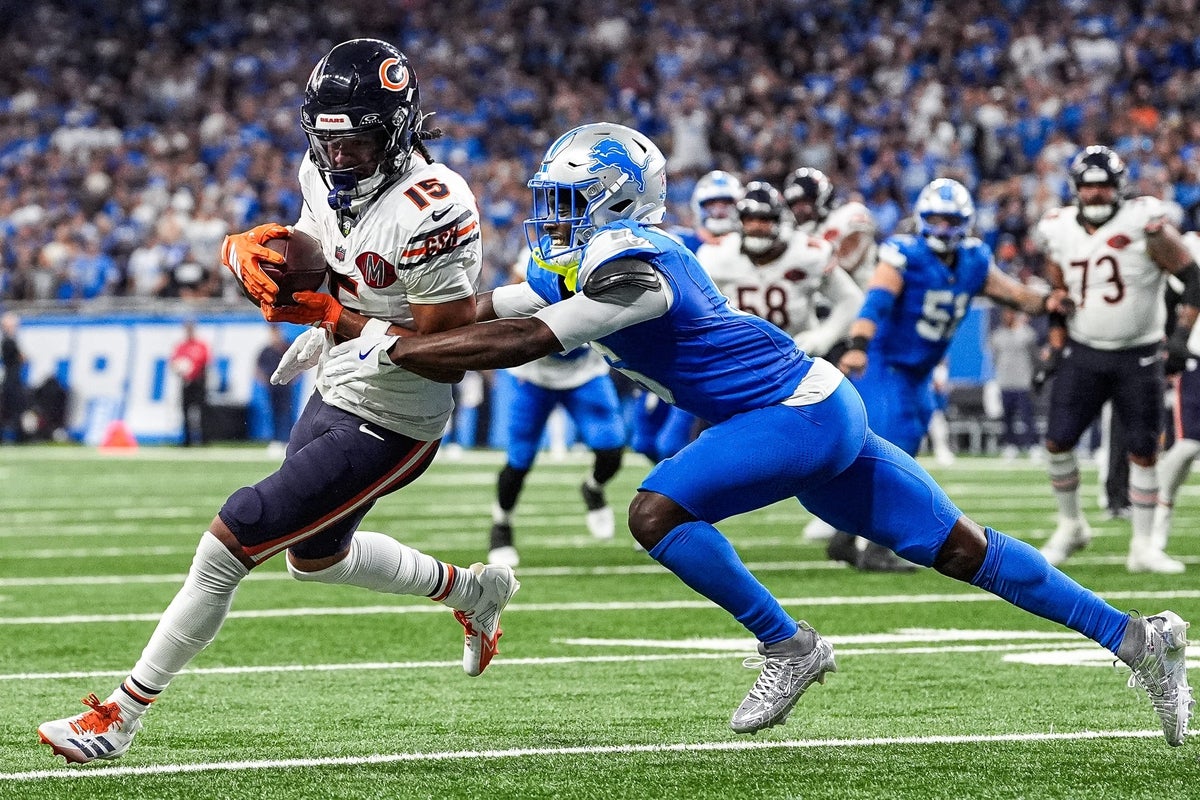 Detroit Lions cornerback Terrion Arnold (6) tackles Chicago Bears wide receiver Rome Odunze (15) during the second half at Ford Field in Detroit on Sunday, Sept. 14, 2025.