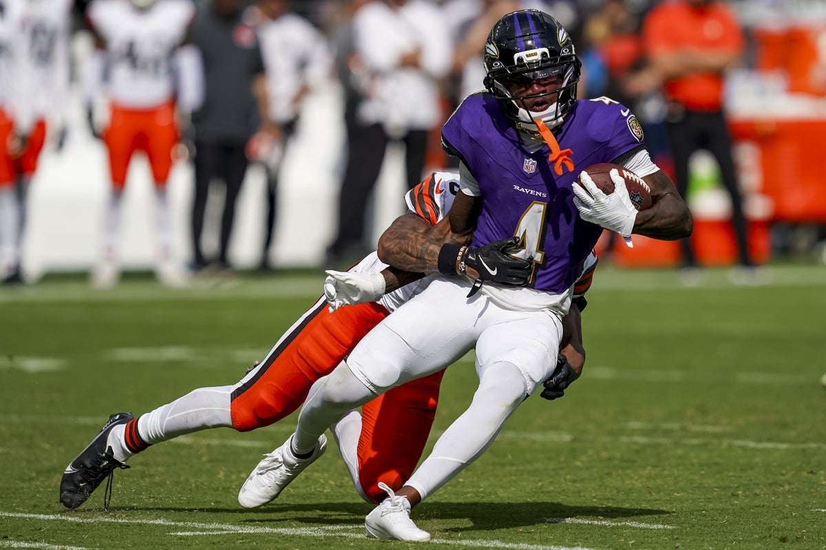 Sep 14, 2025; Baltimore, Maryland, USA; Baltimore Ravens wide receiver Zay Flowers (4) completes a reception during the fourth quarter at M&T Bank Stadium. Mandatory Credit: Mitch Stringer-Imagn Images