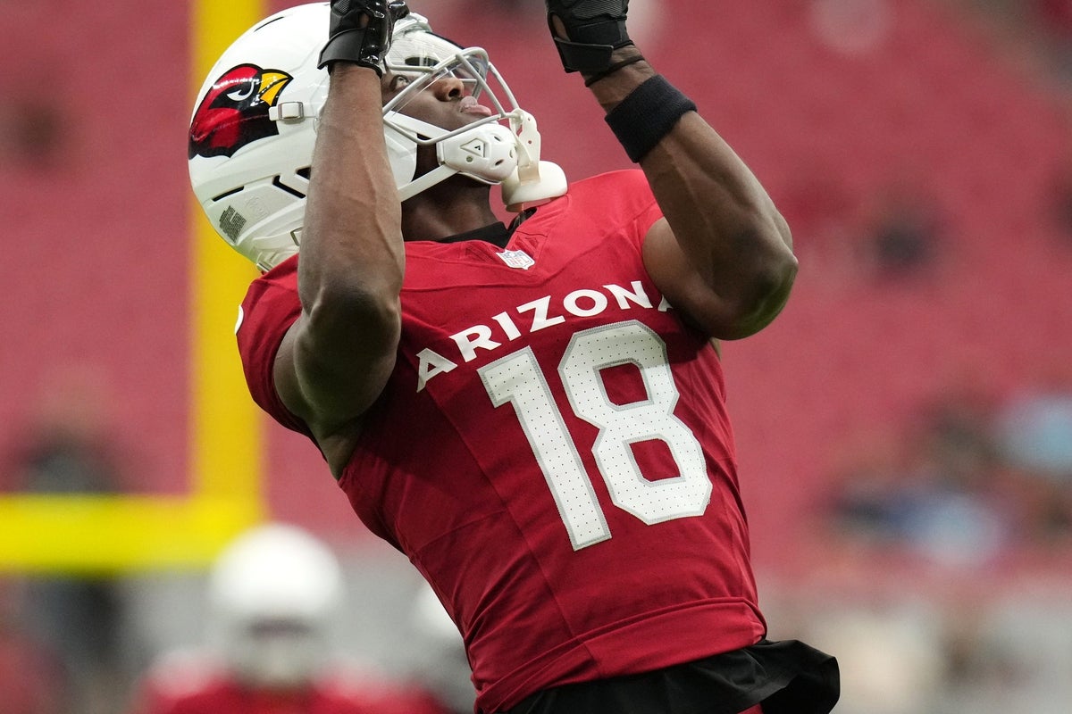 Arizona Cardinals receiver Marvin Harrison Jr. (18) catches a pass during warmups before their game against the Carolina Panthers at State Farm Stadium on Sept 14, 2025.