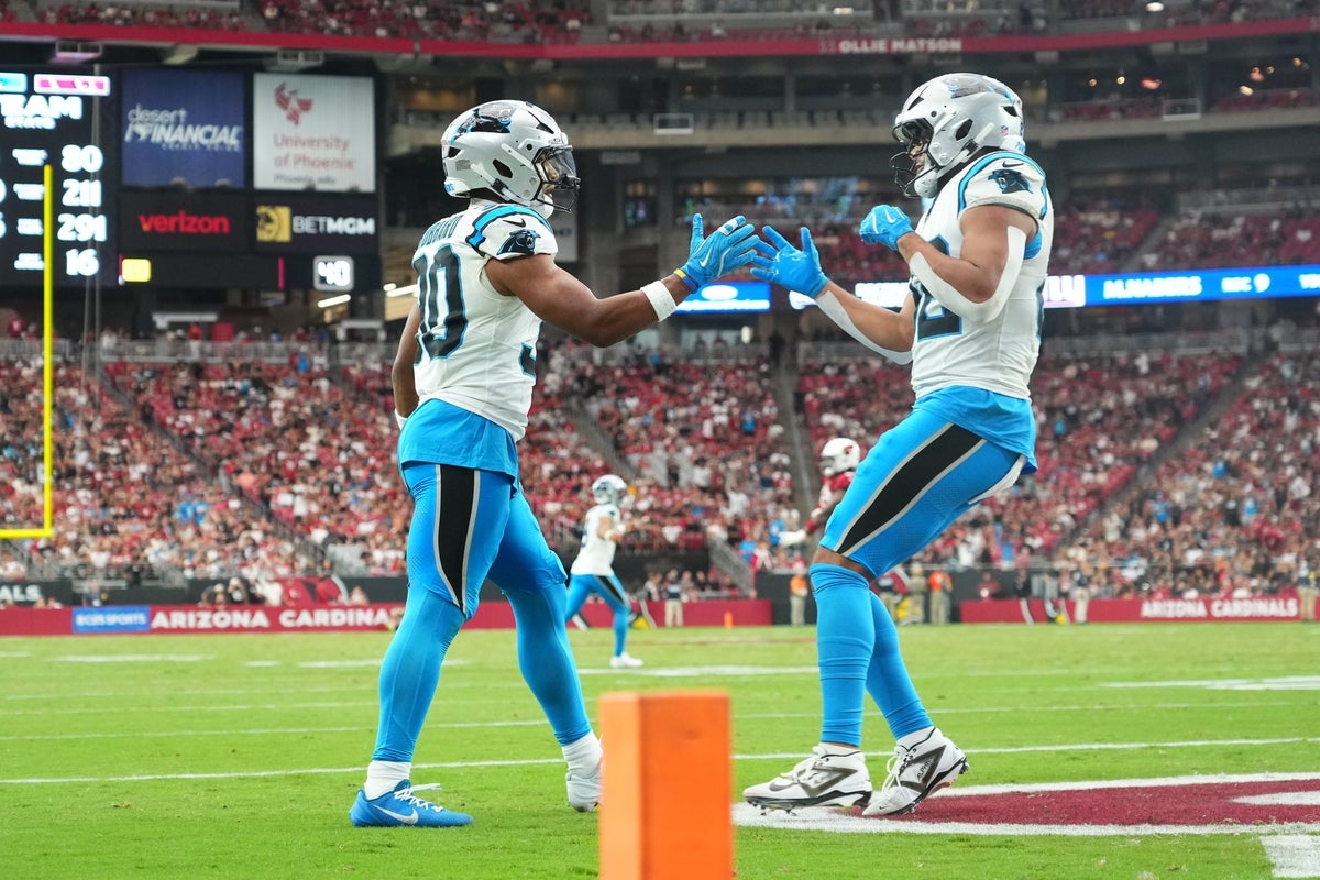Sep 14, 2025; Glendale, Arizona, USA;  Carolina Panthers running back Chuba Hubbard (30) reacts during the fourth quarter against the Arizona Cardinals at State Farm Stadium. Mandatory Credit: Joe Camporeale-Imagn Images