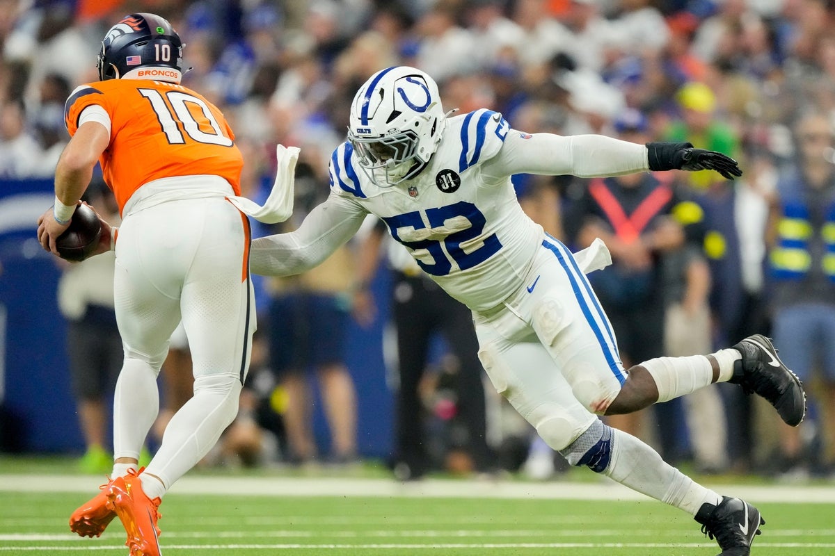 Indianapolis Colts defensive end Samson Ebukam (52) moves in on Denver Broncos quarterback Bo Nix (10) on Sunday, Sept. 14, 2025, during a game at Lucas Oil Stadium in Indianapolis.