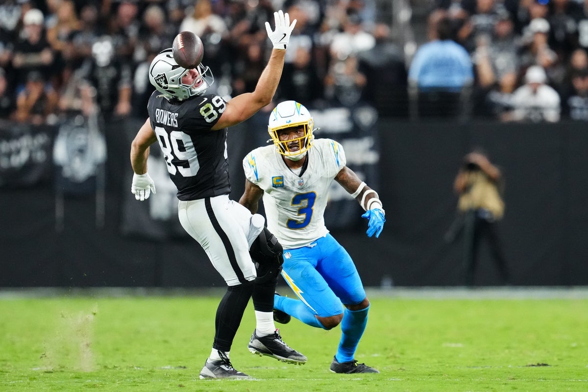 Sep 15, 2025; Paradise, Nevada, USA; Las Vegas Raiders tight end Brock Bowers (89) misses a catch as Los Angeles Chargers safety Derwin James Jr. (3) defends during the fourth quarter at Allegiant Stadium. Mandatory Credit: Stephen R. Sylvanie-Imagn Images