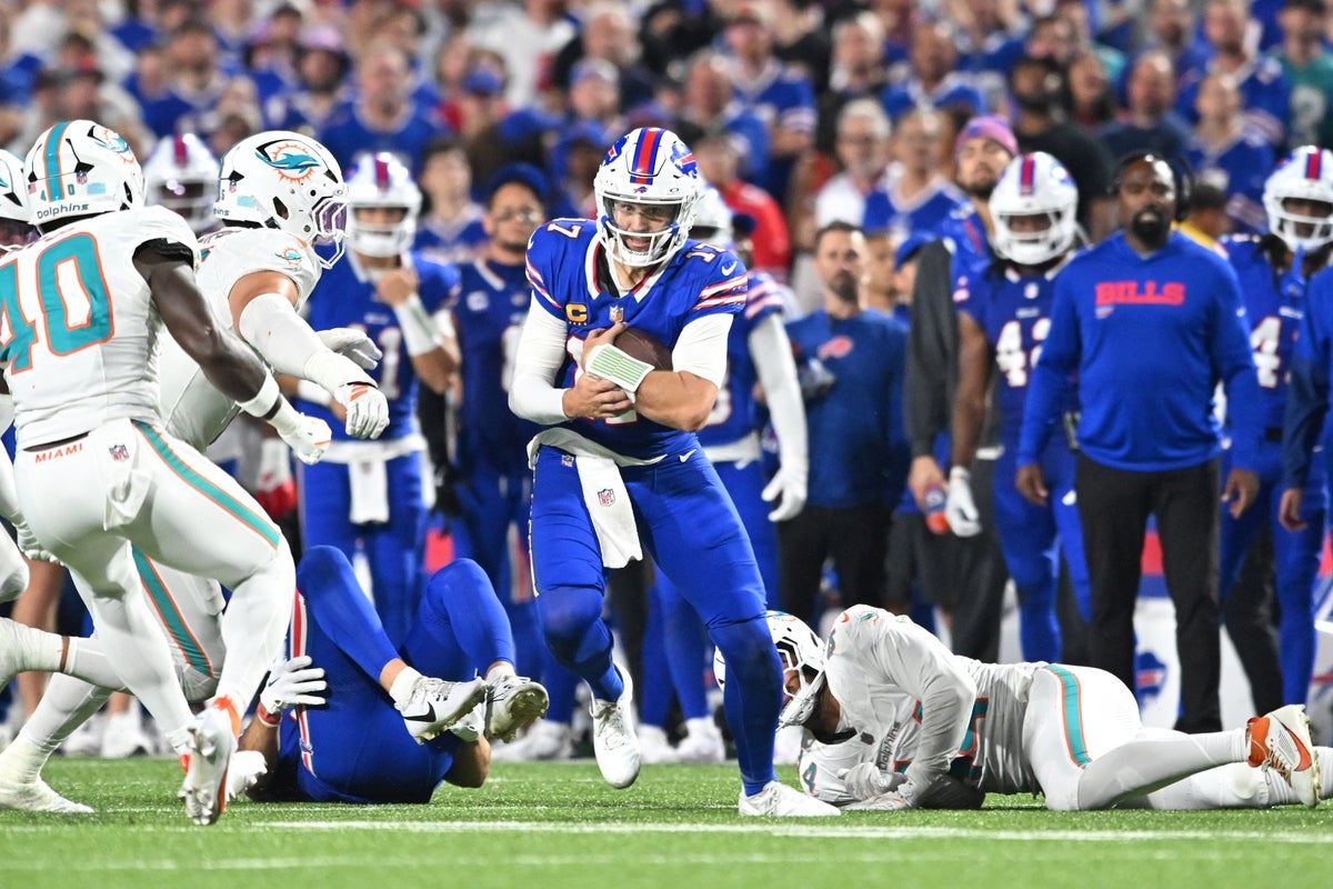 Sep 18, 2025; Orchard Park, New York, USA; Buffalo Bills quarterback Josh Allen (17) runs the ball against the Miami Dolphins in the second half at Highmark Stadium. Mandatory Credit: Mark Konezny-Imagn Images
