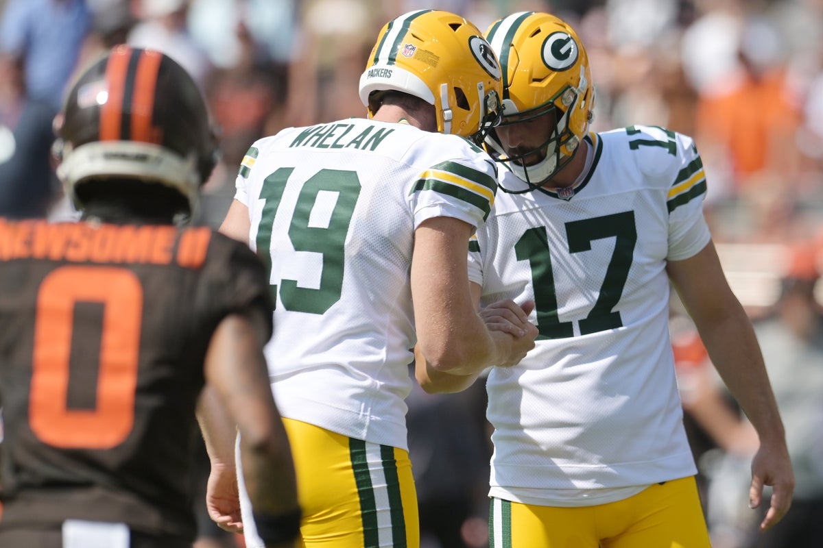 Sep 21, 2025; Cleveland, Ohio, USA; Green Bay Packers place kicker Brandon McManus (17) celebrates with holder Daniel Whelan (19) after kicking a field goal against the Cleveland Browns during the second quarter at Huntington Bank Field. Mandatory Credit: Ken Blaze-Imagn Images