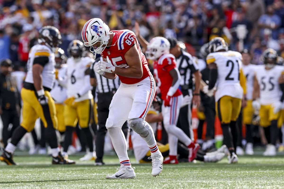Sep 21, 2025; Foxborough, Massachusetts, USA; New England Patriots tight end Hunter Henry (85) reacts after the game at Gillette Stadium. Mandatory Credit: Paul Rutherford-Imagn Images