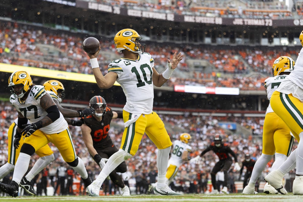 Cleveland Browns safety Grant Delpit (9) picks up yards after intercepting a pass thrown by Green Bay Packers quarterback Jordan Love (10) during the second half of an NFL football game at Huntington Bank Field, Sept. 21, 2025, in Cleveland, Ohio.