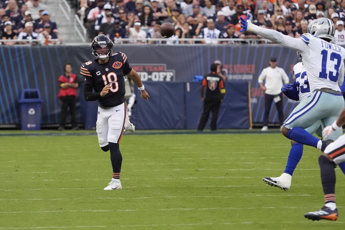 Sep 21, 2025; Chicago, Illinois, USA; Chicago Bears quarterback Caleb Williams (18) runs the ball against the Dallas Cowboys during the second half at Soldier Field. Mandatory Credit: David Banks-Imagn Images