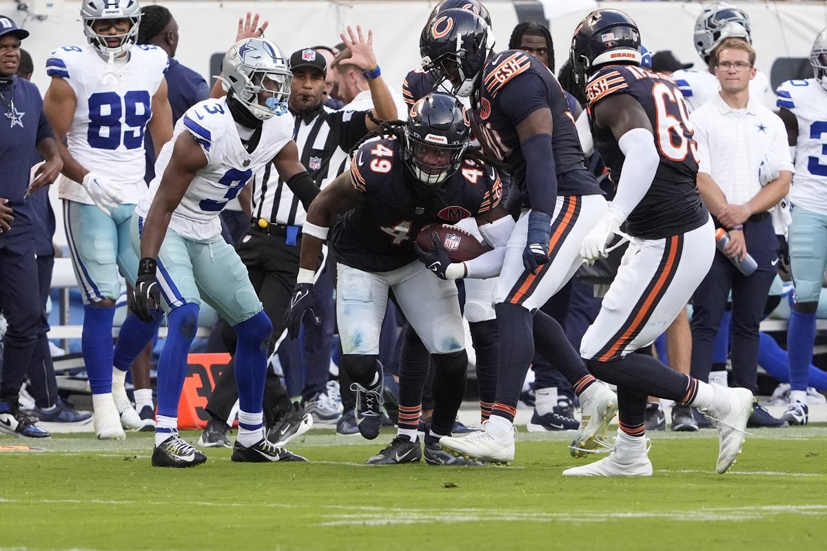 Sep 21, 2025; Chicago, Illinois, USA; Chicago Bears middle linebacker Tremaine Edmunds (49) intercepts a pass in front of Dallas Cowboys wide receiver George Pickens (3) during the second half at Soldier Field. Mandatory Credit: David Banks-Imagn Images