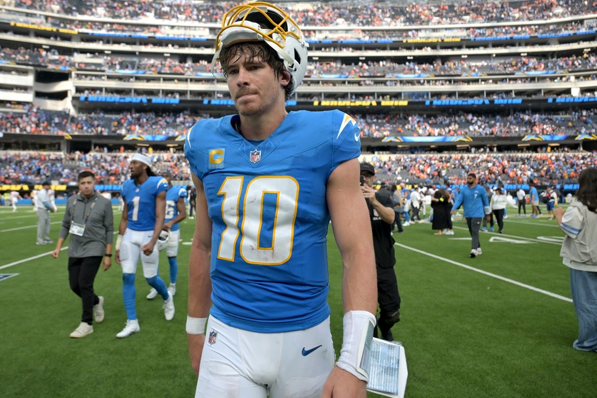 Sep 21, 2025; Inglewood, California, USA; Los Angeles Chargers quarterback Justin Herbert (10) leaves the field after defeating the Denver Broncos 23-20 at SoFi Stadium. Mandatory Credit: Jayne Kamin-Oncea-Imagn Images
