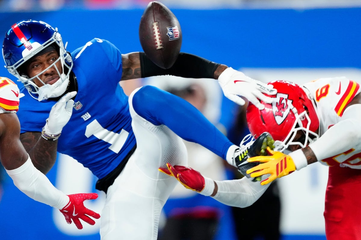 New York Giants wide receiver Malik Nabers (1) looks at a ball that was meant for him as he gets ready to fall in the end zone, in the fourth quarter, Sunday, September 21, 2025. Kansas City Chiefs cornerback Nohl Williams (20) and Kansas City Chiefs safety Bryan Cook (6) is shown on Nabers