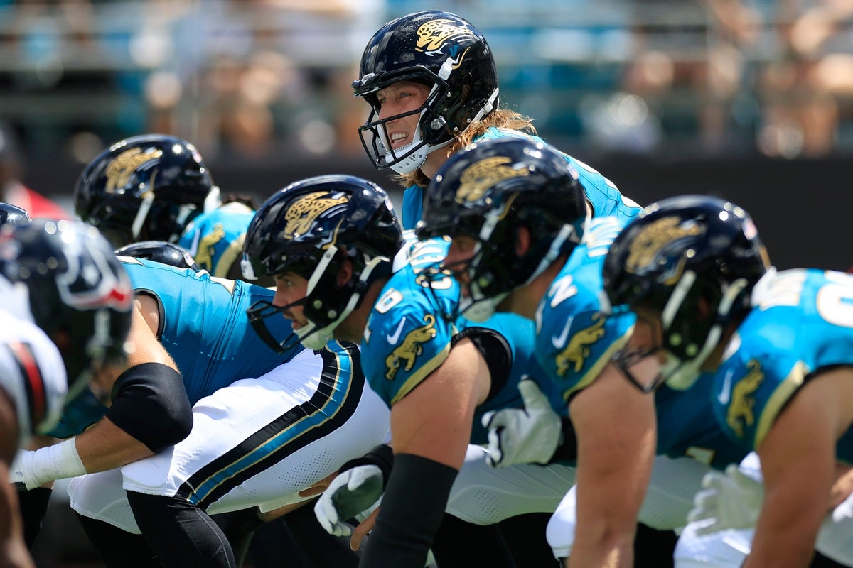 Jacksonville Jaguars quarterback Trevor Lawrence (16) prepares to receive the snap during the first quarter of an NFL football matchup at EverBank Stadium, Sunday, Sept. 21, 2025, in Jacksonville, Fla. The Jaguars defeated the Texans 17-10.