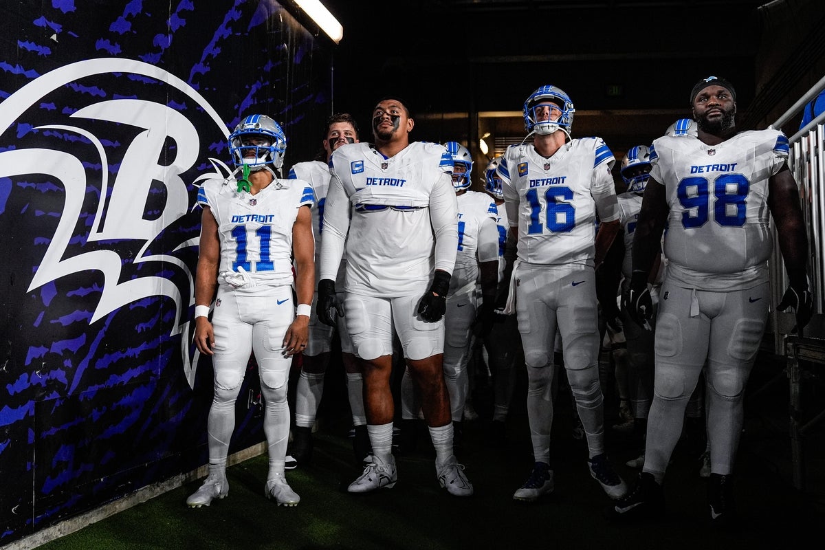 From left, Detroit Lions wide receiver Kalif Raymond (11), right tackle Penei Sewell (58), quarterback Jared Goff (16) and defensive tackle DJ Reader (98) get ready to take the field for first half against the Baltimore Ravens at M&T Bank Stadium in Baltimore, Md. on Monday, Sept. 22, 2025.