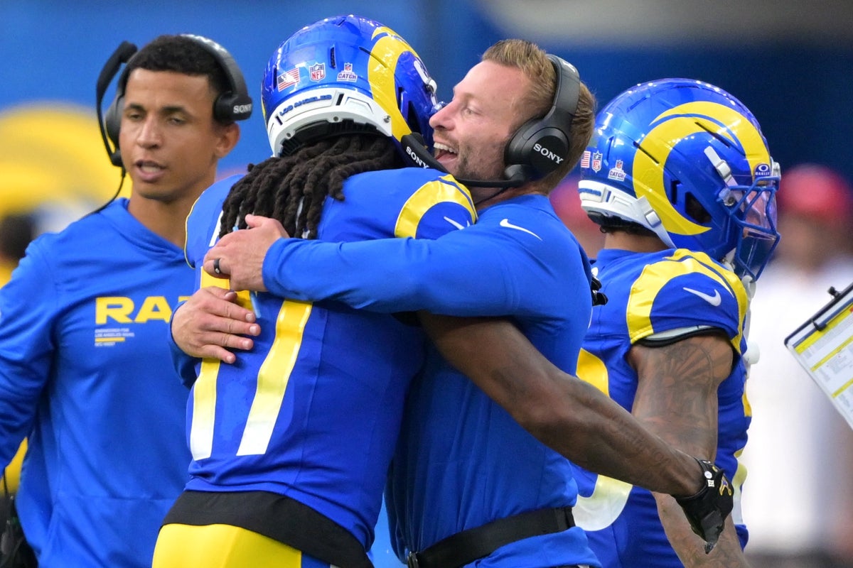 Sep 28, 2025; Inglewood, California, USA; Los Angeles Rams wide receiver Davante Adams (17) is hugged by head coach Sean McVay as time runs out against the Indianapolis Colts at SoFi Stadium. Mandatory Credit: Jayne Kamin-Oncea-Imagn Images