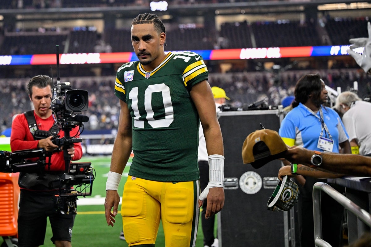 Sep 28, 2025; Arlington, Texas, USA; Green Bay Packers quarterback Jordan Love (10) walks off the field after the game between the Dallas Cowboys and the Green Bay Packers at AT&T Stadium. Mandatory Credit: Jerome Miron-Imagn Images