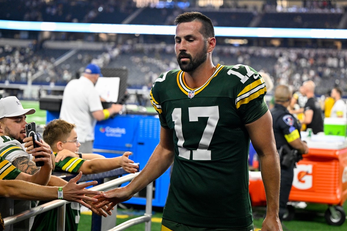 Sep 28, 2025; Arlington, Texas, USA; Green Bay Packers place kicker Brandon McManus (17) walks off the field after he kicks the game tying field goal in overtime during the game between the Dallas Cowboys and the Green Bay Packers at AT&T Stadium. Mandatory Credit: Jerome Miron-Imagn Images