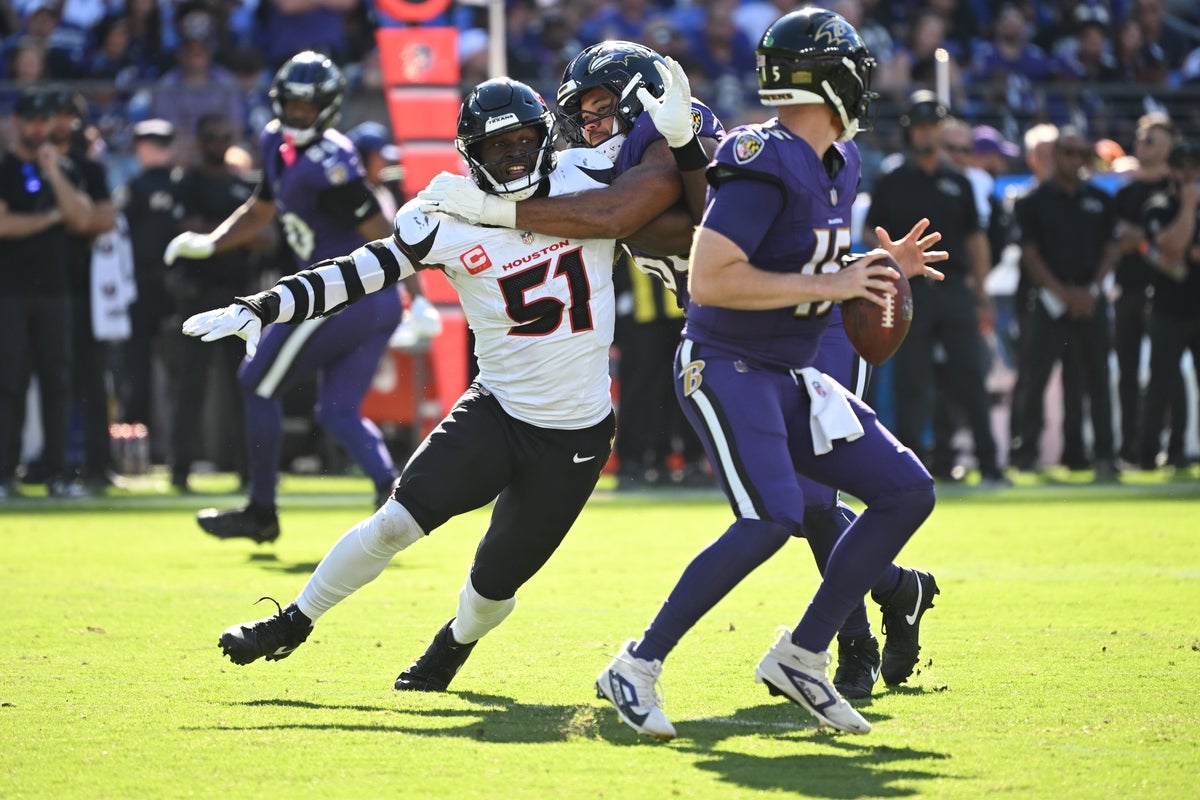 Oct 5, 2025; Baltimore, Maryland, USA; Houston Texans defensive end Will Anderson Jr. (51) rushes Baltimore Ravens quarterback Cooper Rush (15) during the fourth quarter at M&T Bank Stadium. Mandatory Credit: Rafael Suanes-Imagn Images