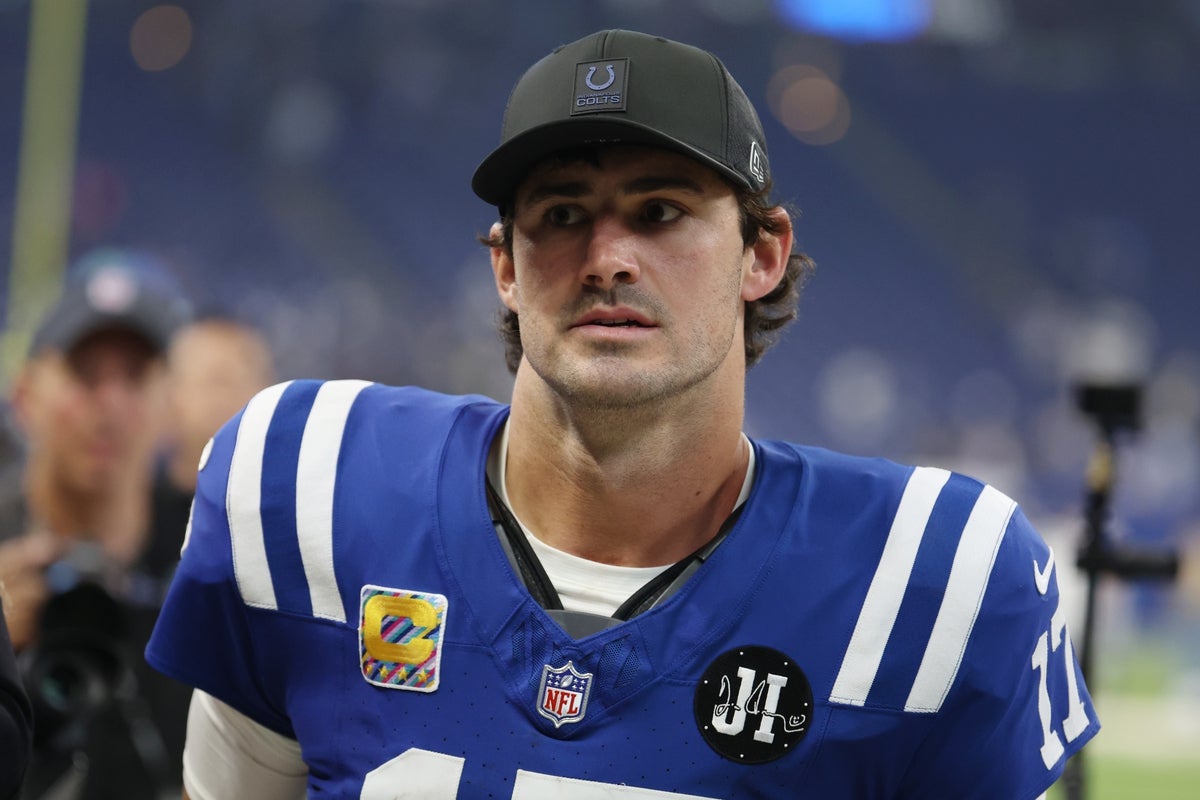 Oct 5, 2025; Indianapolis, Indiana, USA; Indianapolis Colts quarterback Daniel Jones (17) walks off the field after their win against the Las Vegas Raiders at Lucas Oil Stadium. Mandatory Credit: Trevor Ruszkowski-Imagn Images