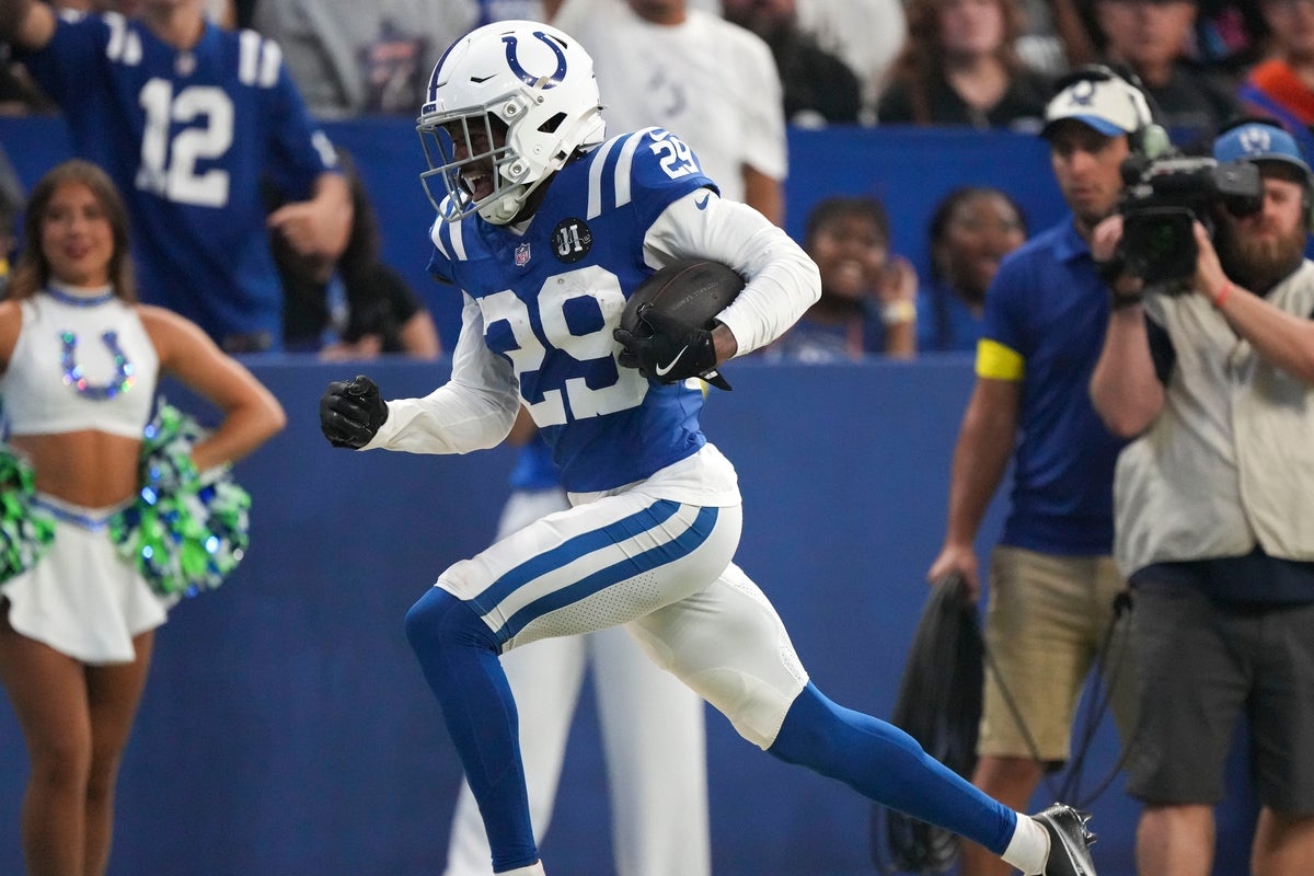Indianapolis Colts cornerback Mekhi Blackmon (29) runs with the ball after intercepting a pass thrown by Las Vegas Raiders quarterback Geno Smith (7) on Sunday, Oct. 5, 2025, during a game at Lucas Oil Stadium in Indianapolis. The Colts defeated the Raiders 40-6.