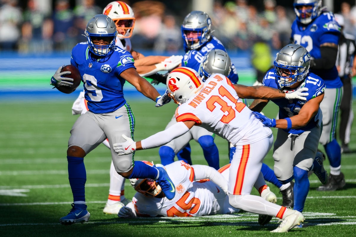 Oct 5, 2025; Seattle, Washington, USA; Seattle Seahawks running back Kenneth Walker III (9) carries the ball against the Tampa Bay Buccaneers during the second half at Lumen Field. Mandatory Credit: Steven Bisig-Imagn Images
