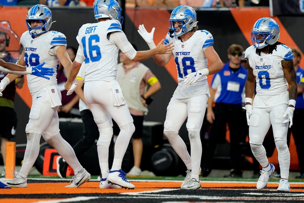 Detroit Lions quarterback Jared Goff (16) and Detroit Lions wide receiver Isaac TeSlaa (18) celebrate their touchdown in the 4th quarter over the Cincinnati Bengals and at Paycor Stadium on October 5, 2025.