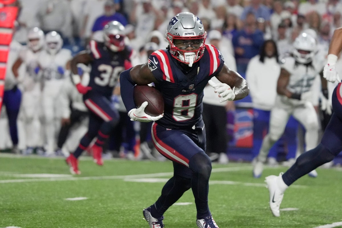 New England Patriots wide receiver Stefon Diggs gets about 10 yards on the play after catching a pass during second half action at Highmark Stadium in Orchard Park on Oct. 5, 2025.