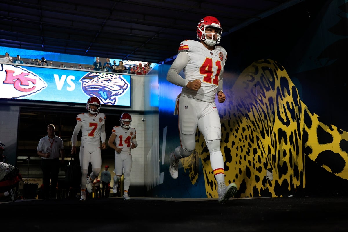 Kansas City Chiefs long snapper James Winchester (41) runs on the field ahead of kicker Harrison Butker (7) and punter Matt Araiza (14) before an NFL football matchup at EverBank Stadium, Monday, Oct. 6, 2025, in Jacksonville, Fla. The Jacksonville Jaguars edged the Kansas City Chiefs 31-28. [Corey Perrine/Florida Times-Union]
