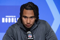 Mar 3, 2023; Indianapolis, IN, USA; Ohio State quarterback C J Stroud (QB12) speaks to the press at the NFL Combine at Lucas Oil Stadium. Mandatory Credit: Trevor Ruszkowski-USA TODAY Sports