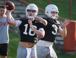 Texas Longhorns quarter backs Arch Manning and Quinn Ewers throws the football during Texas Longhorns football spring practice at the Frank Denius practice fields in Austin, TX Wednesday, March 8, 2023.  Quarterbacks