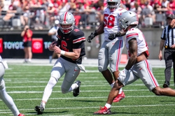 Apr 15, 2023; Columbus, Ohio, United States;  Ohio State Buckeyes quarterback Kyle McCord (6) runs the ball through an opening in the Buckeyes defensive line during the third quarter of the Ohio State Buckeyes spring game at Ohio Stadium on Saturday morning. Mandatory Credit: Joseph Scheller-The Columbus Dispatch  Football Ceb Osufb Spring Game Ohio State At Ohio State