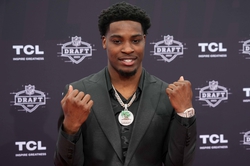 Apr 27, 2023; Kansas City, MO, USA; Illinois Fighting Illini cornerback Devon Witherspoon poses on the red carpet at the National World War I Museum and Memorial. Mandatory Credit: Kirby Lee-USA TODAY Sports