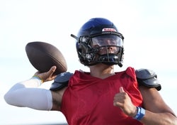 Quarterback Dylan Raiola throws during a scrimmage in Chandler, AZ.