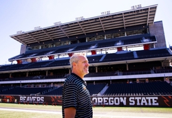 Oregon State University Director of Intercollegiate Athletics Scott Barnes looks around Reser Stadium in Corvallis as workers put the finishing touches to the expanded facility in preparation for a new season.