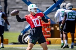 Oregon quarterback Bo Nix works out during practice with the Ducks Friday, Aug. 11, 2023, in Eugene.