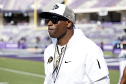 Sep 2, 2023; Fort Worth, Texas, USA; Colorado Buffaloes head coach Deion Sanders walks on the field before the game against the TCU Horned Frogs at Amon G. Carter Stadium. Mandatory Credit: Tim Heitman-USA TODAY Sports