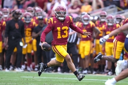 Sep 2, 2023; Los Angeles, California, USA; Southern California Trojans quarterback Caleb Williams (13) carries the ball on a 46-yard run against the Nevada Wolf Pack in the first half at United Airlines Field at Los Angeles Memorial Coliseum. Mandatory Credit: Kirby Lee-USA TODAY Sports