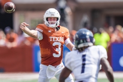 Texas Longhorns quarterback Quinn Ewers (3) passes the ball as Rice Owls cornerback Sean Fresch (1) tries to make a play on the ball in the first half of an NCAA college football game, Saturday, Sept. 2, 2023, in Austin, Texas.
